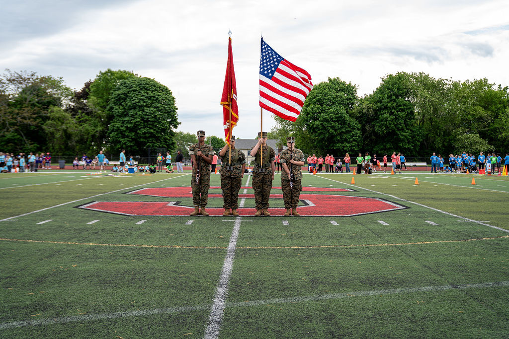 Salem High School Marine Corps JROTC performs at the SHS football game.